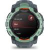 imageWearable4U Garmin Instinct 3 50 mm AMOLED Display Rugged Outdoor GPS Smartwatch MetalReinforced Bezel Builtin Flashlight Up to 18 Days of Battery Life Neotropic with Twilight Band Bundle